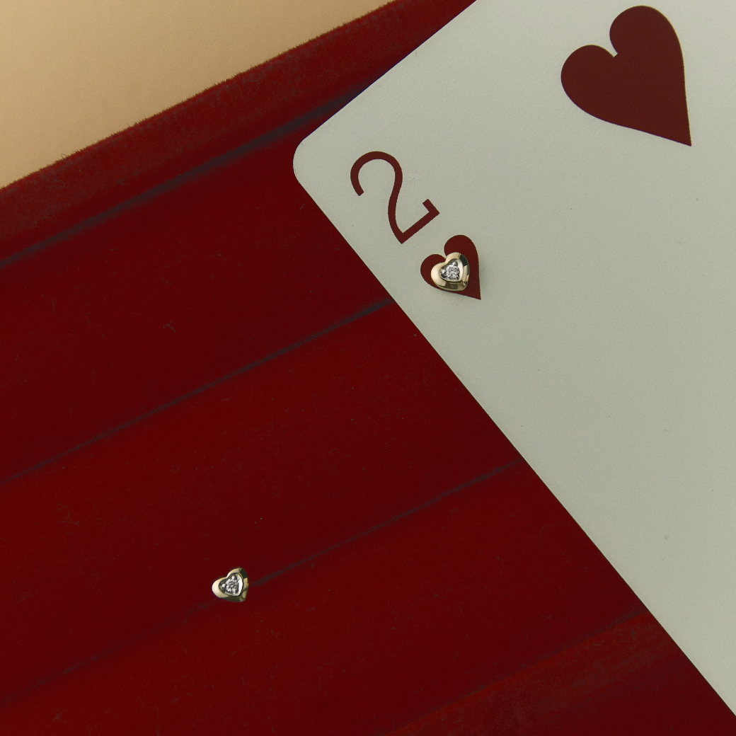 The Four Suits Piercing