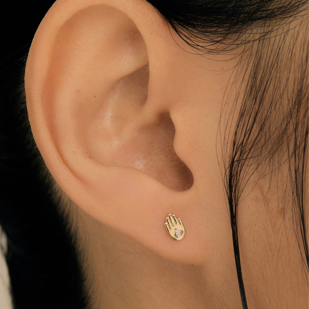 Hamsa Hand Piercing