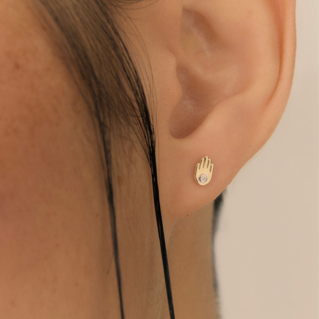 Hamsa Hand Piercing