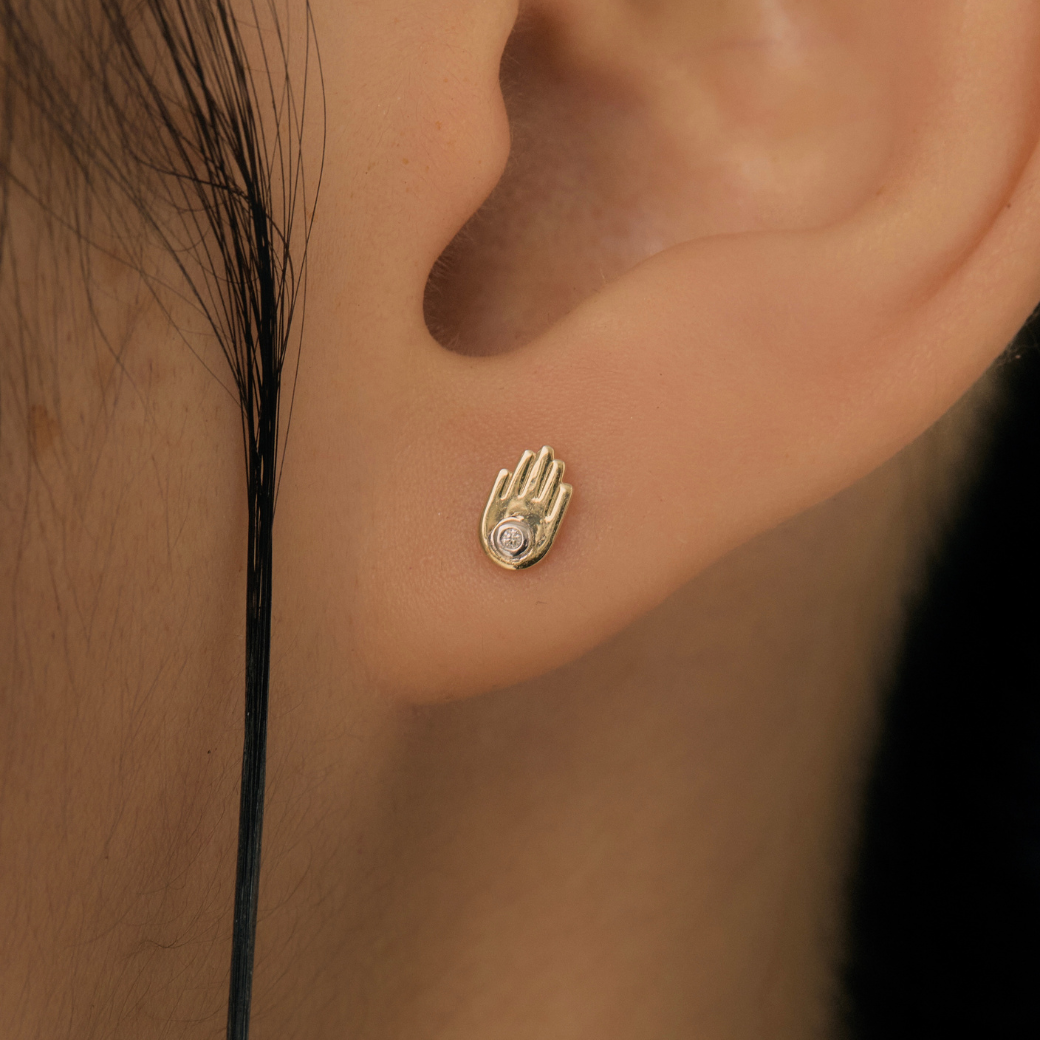Hamsa Hand Piercing